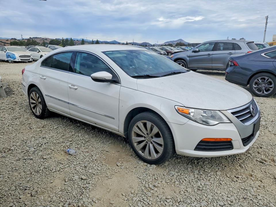 2011 Volkswagen Passat cc VIN WVWMN7AN7BE728734 COPART salvage auction — MINOR DENT/SCRATCHES, FL - DIS/DLR/EXP ONLY CLEAN TITLE, sold $250 on 2026-07-28 (photo 4)