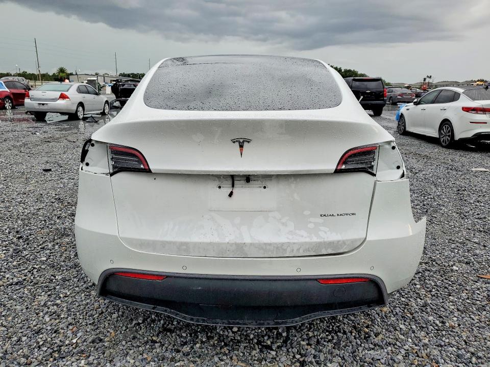 2022 Tesla Model y VIN 7SAYGDEEXNA017150 COPART salvage auction — ALL OVER, FL - CERT OF TITLE SLVG REBUILDABLE, sold $5,500 on 2026-07-24 (photo 6)