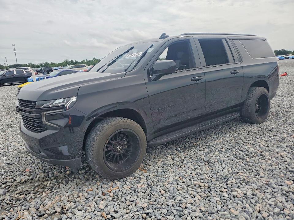 2023 Chevrolet Suburban VIN 1GNSCEKD0PR439404 — COPART salvage auction photo