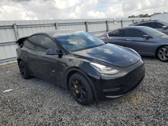2020 Tesla Cybertruck VIN 5YJYGDEE2LF029838 COPART salvage auction — REAR END, Fl - Certificate Of Destruction, sold $6,700 on 2026-07-31 (photo 4)