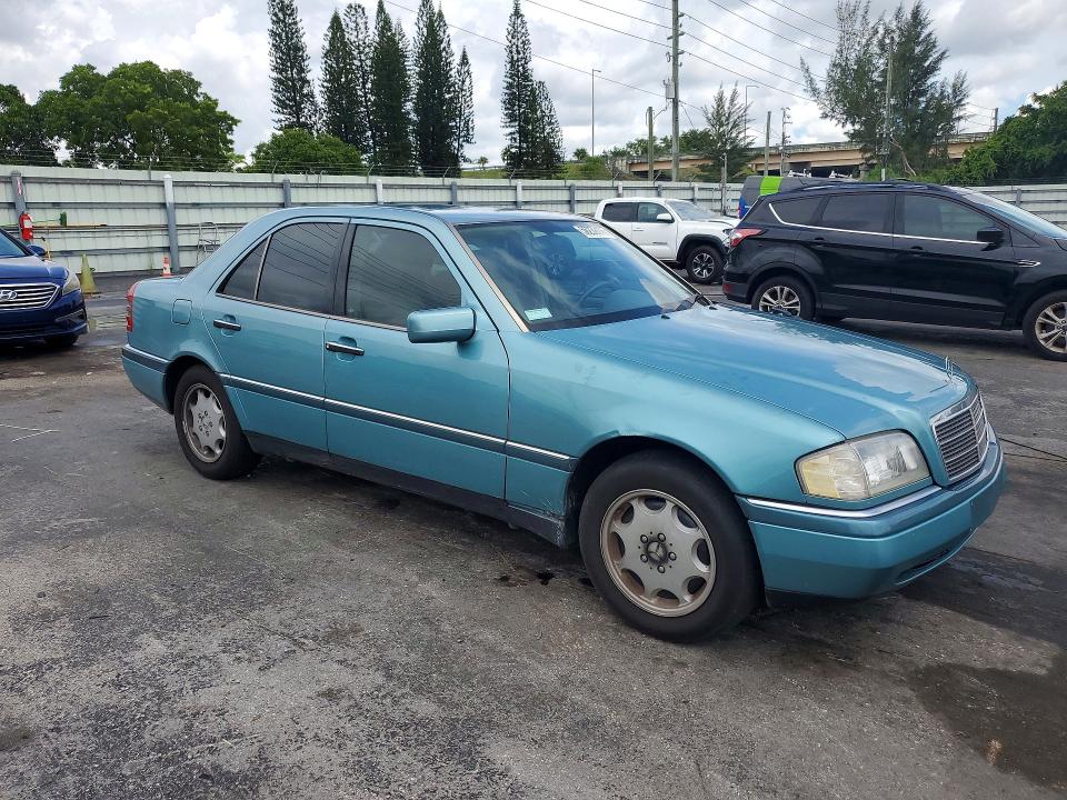 1994 Mercedes-benz C class VIN WDBHA22E6RF071975 COPART salvage auction — SIDE, Fl - Cert Of Title Slvg Rebuildable, sold $875 on 2026-07-20 (photo 4)