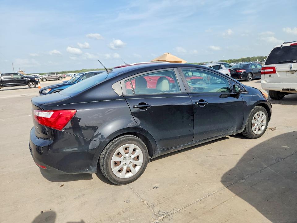 2015 Kia Rio VIN KNADM4A39F6527091 COPART salvage auction — NORMAL WEAR, Tx - Certificate Of Title, sold $975 on 2026-07-30 (photo 3)