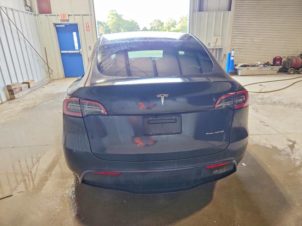 2025 Tesla Model y VIN 7SAYGDEE9SF318510 COPART salvage auction — SIDE, Pa - Cert Of Title, sold $16,800 on 2026-07-30 (photo 6)