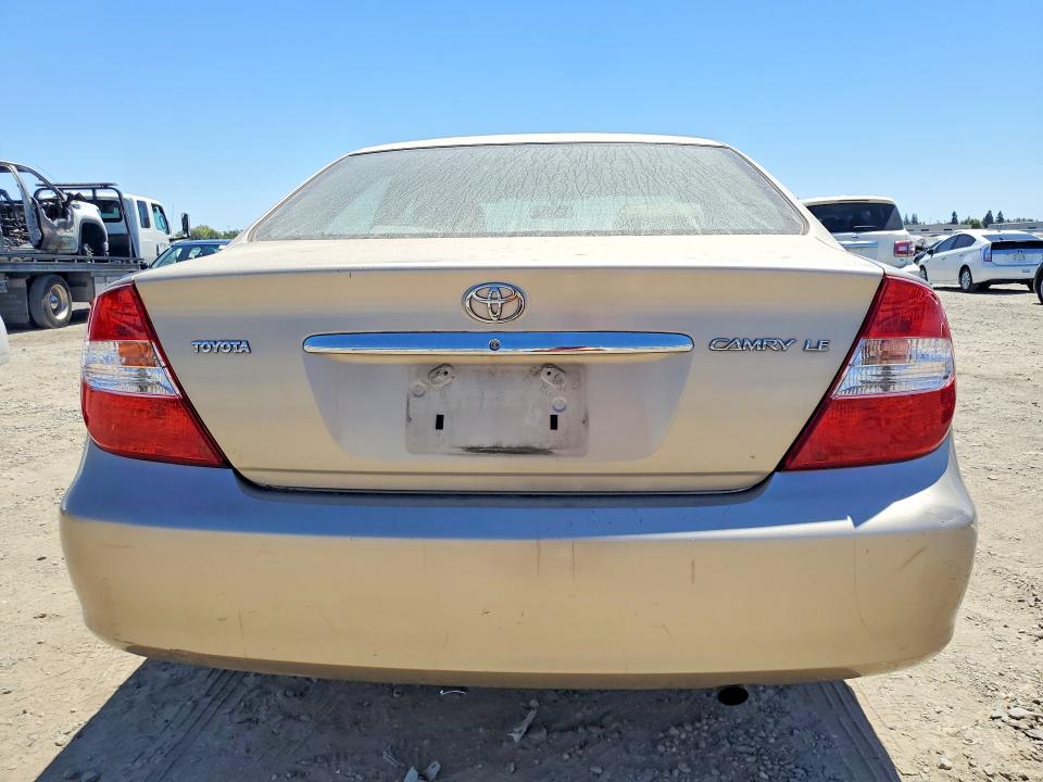 2002 Toyota Camry VIN JTDBE32K520115786 COPART salvage auction — DAMAGE HISTORY, CA - SALVAGE CERTIFICATE, sold $15 on 2026-07-21 (photo 6)