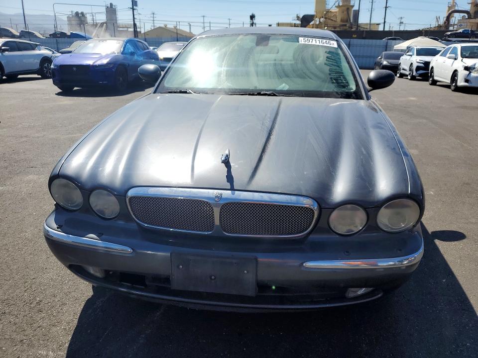 2006 Jaguar Xj series VIN SAJWA79B66SH09019 COPART salvage auction — MINOR DENT/SCRATCHES, CA - DIS/DLR/EXP ONLY CLEAN TITLE, sold $500 on 2026-07-28 (photo 5)
