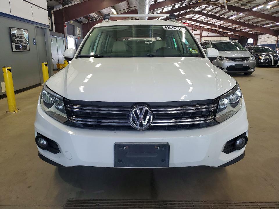 2012 Volkswagen Tiguan VIN WVGBV7AX2CW607397 COPART salvage auction — REAR END, Vt - Certificate Of Title, sold $1,650 on 2026-08-03 (photo 5)