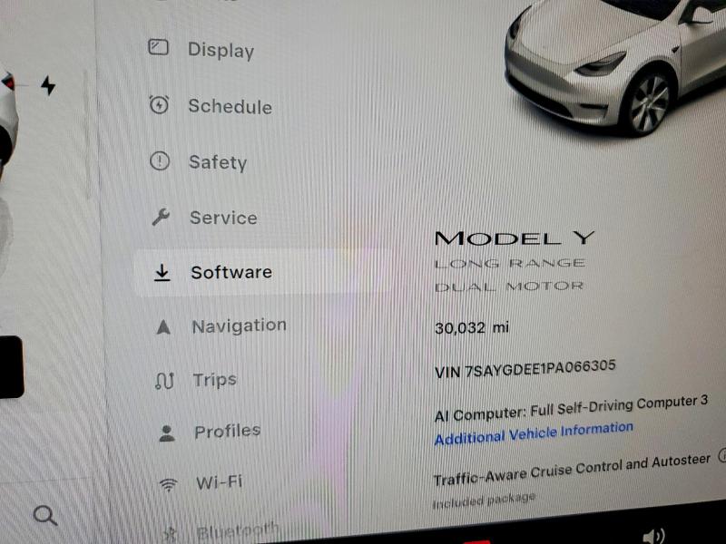 2023 Tesla Model y VIN 7SAYGDEE1PA066305 COPART salvage auction — REAR END, IA - CERT OF TITLE-SALVAGE TITLE, sold $200 on 2026-07-29 (photo 9)
