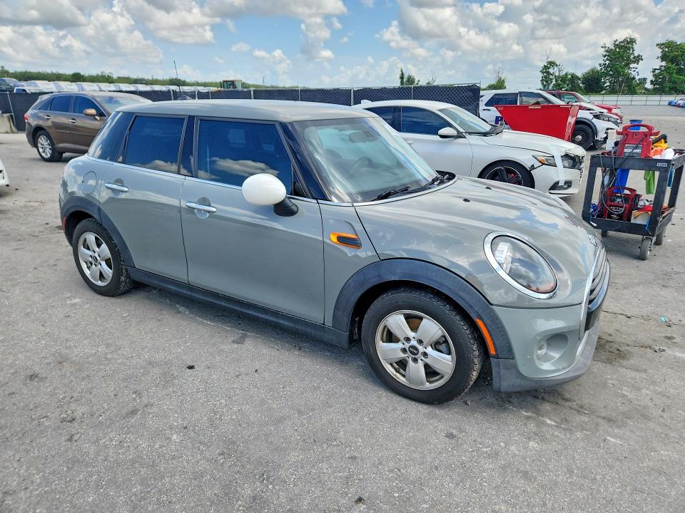 2019 Mini Cooper VIN WMWXU1C54K2J02700 COPART salvage auction — MINOR DENT/SCRATCHES, Fl - Cert Of Title Slvg Rebuildable, sold $1,550 on 2026-08-11 (photo 4)
