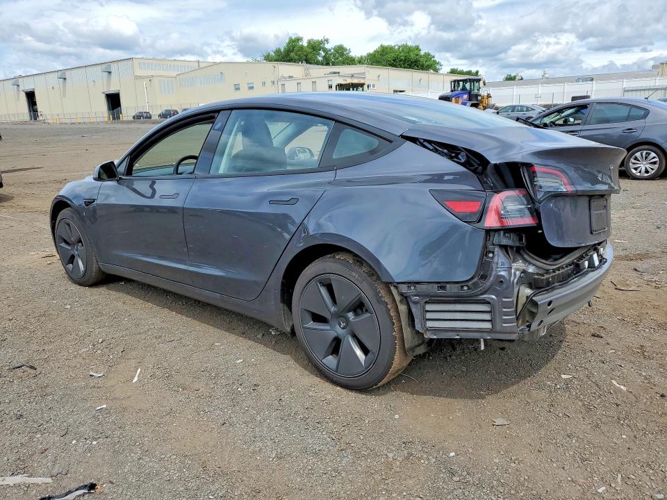 2023 Tesla Model 3 VIN 5YJ3E1EA4PF687243 COPART salvage auction — REAR END, CT - CERT OF TITLE-SALVAGE, sold $3,700 on 2026-07-28 (photo 2)