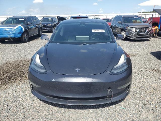 2019 Tesla Model 3 VIN 5YJ3E1EA9KF411021 COPART salvage auction — REAR END, TX - CERTIFICATE OF TITLE (P), sold $3,450 on 2026-07-31 (photo 5)