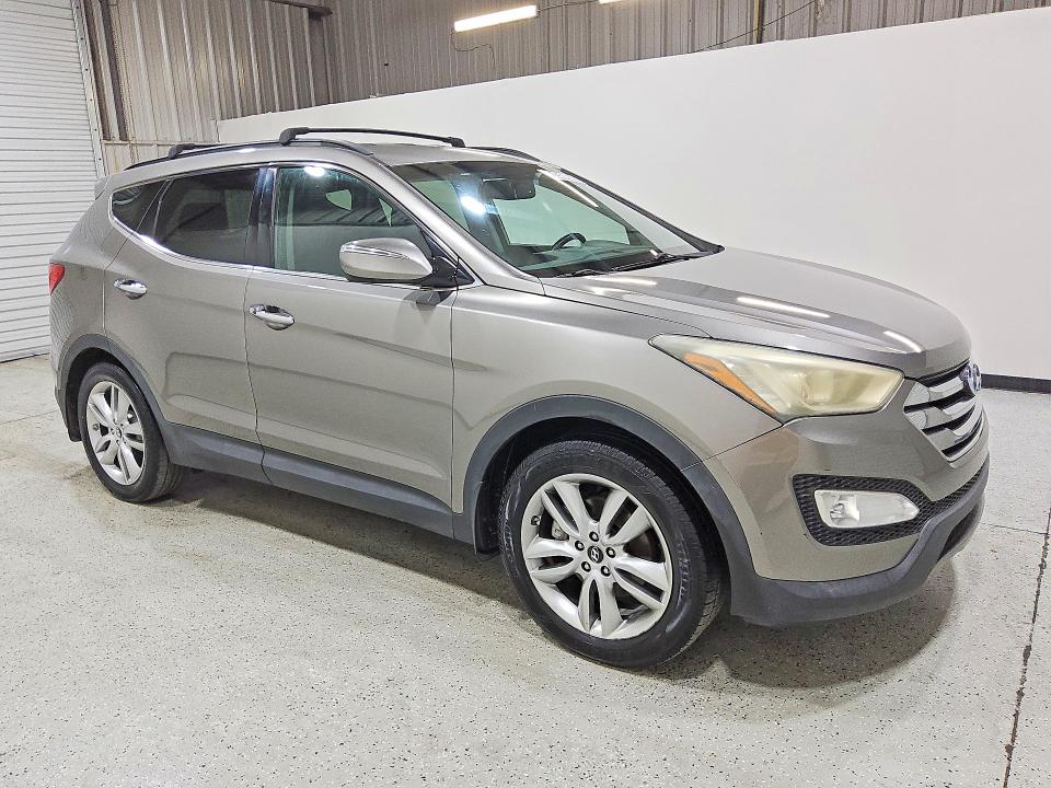 2014 Hyundai Santa fe VIN 5XYZU3LA4EG208126 COPART salvage auction — MECHANICAL, FL - CERTIFICATE OF TITLE, sold $725 on 2026-07-14 (photo 4)