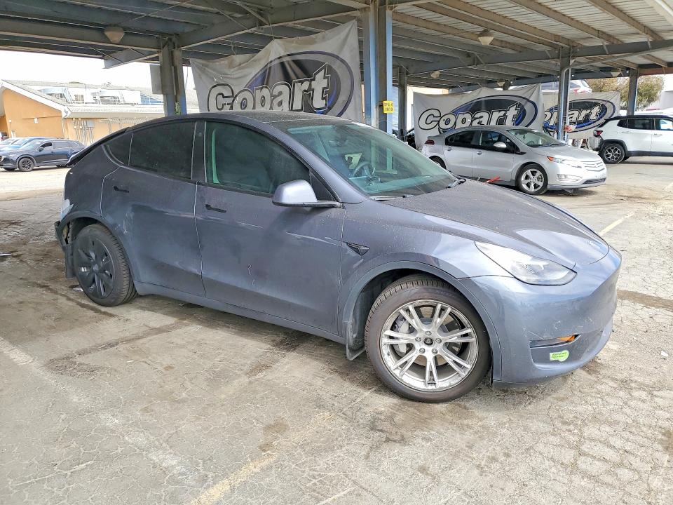 2023 Tesla Model y VIN 7SAYGDEE5PF635305 COPART salvage auction — REAR END, Ca - Salvage Certificate, sold $7,600 on 2026-07-14 (photo 4)