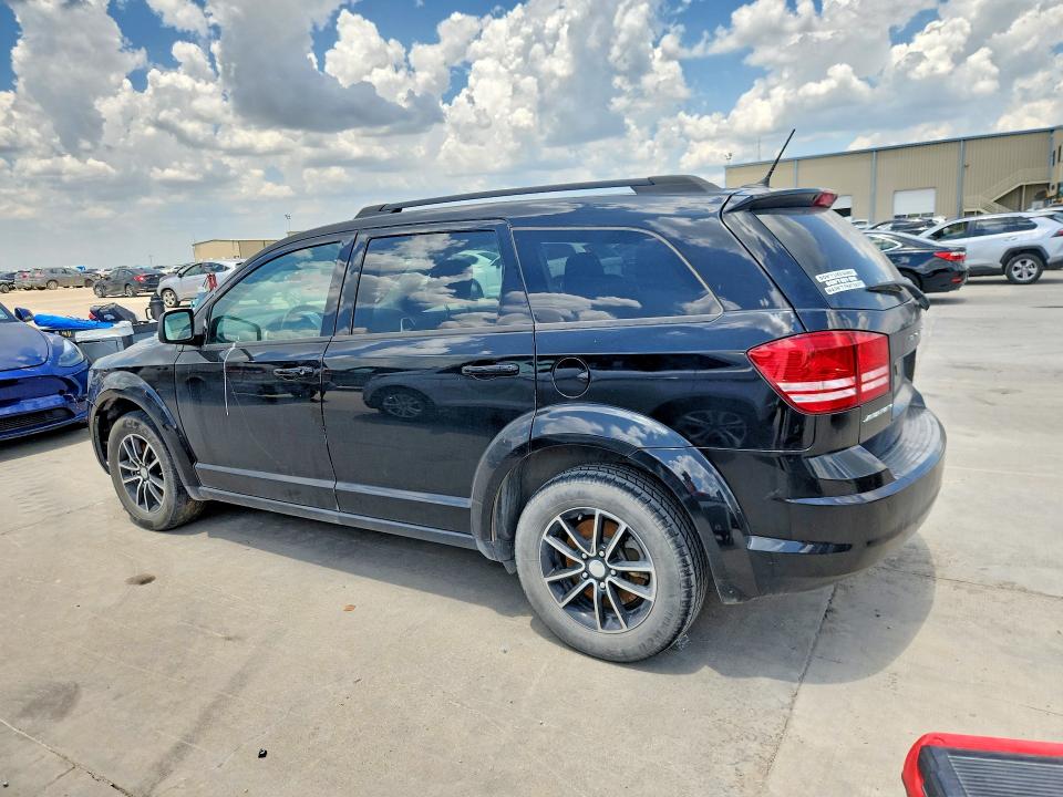 2017 Dodge Journey VIN 3C4PDCABXHT706895 COPART salvage auction — MINOR DENT/SCRATCHES, TX - CERTIFICATE OF TITLE, sold $975 on 2026-08-02 (photo 2)