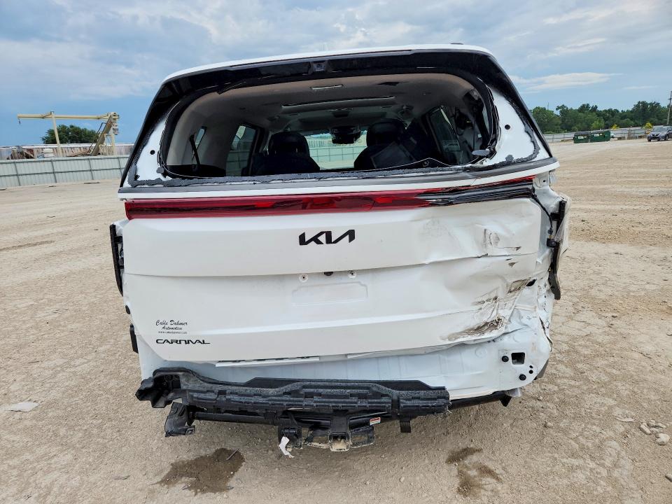 2026 Kia Carnival VIN KNDNE5K32T6594829 COPART salvage auction — REAR END, MO - SALVAGE CERTIFICATE OF TITLE, sold $21,700 on 2026-09-10 (photo 6)