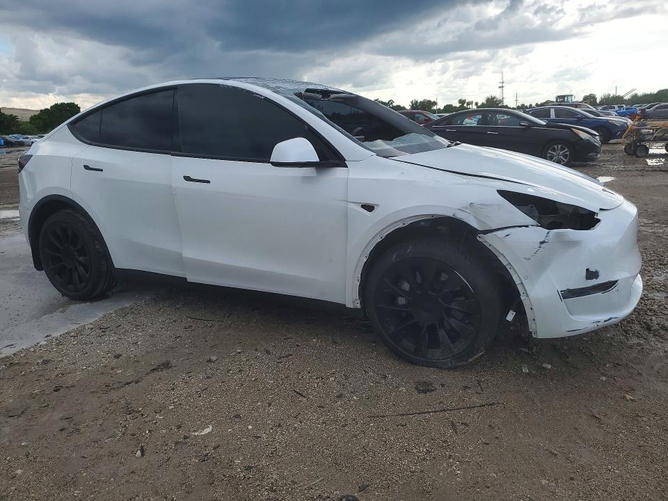 2021 Tesla Model y VIN 5YJYGAEE8MF284221 COPART salvage auction — FRONT END, Fl - Cert Of Title Slvg Rebuildable, sold $9,800 on 2026-09-02 (photo 4)