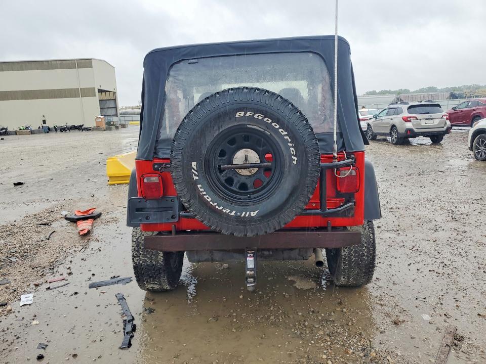 1997 Jeep Wrangler / VIN 1J4FY29P7VP401830 COPART salvage auction — NORMAL WEAR, Ks - Cert Of Title-Rebuilt Salvage, sold $2,050 on 2026-08-11 (photo 6)