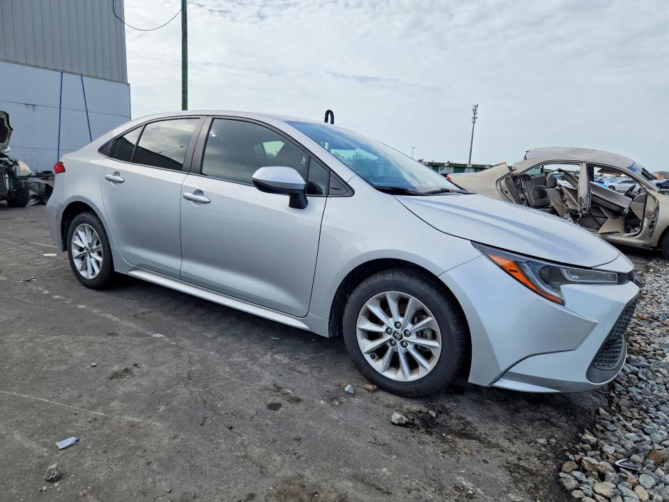 2022 Toyota Corolla VIN JTDVPMAE0N3015087 COPART salvage auction — SIDE, Fl - Cert Of Title Slvg Rebuildable, sold $3,550 on 2026-07-22 (photo 4)