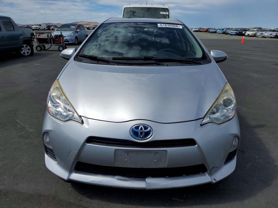 2014 Toyota Prius c VIN JTDKDTB39E1571199 COPART salvage auction — SIDE, CA - SALVAGE CERTIFICATE, sold $950 on 2026-07-27 (photo 5)