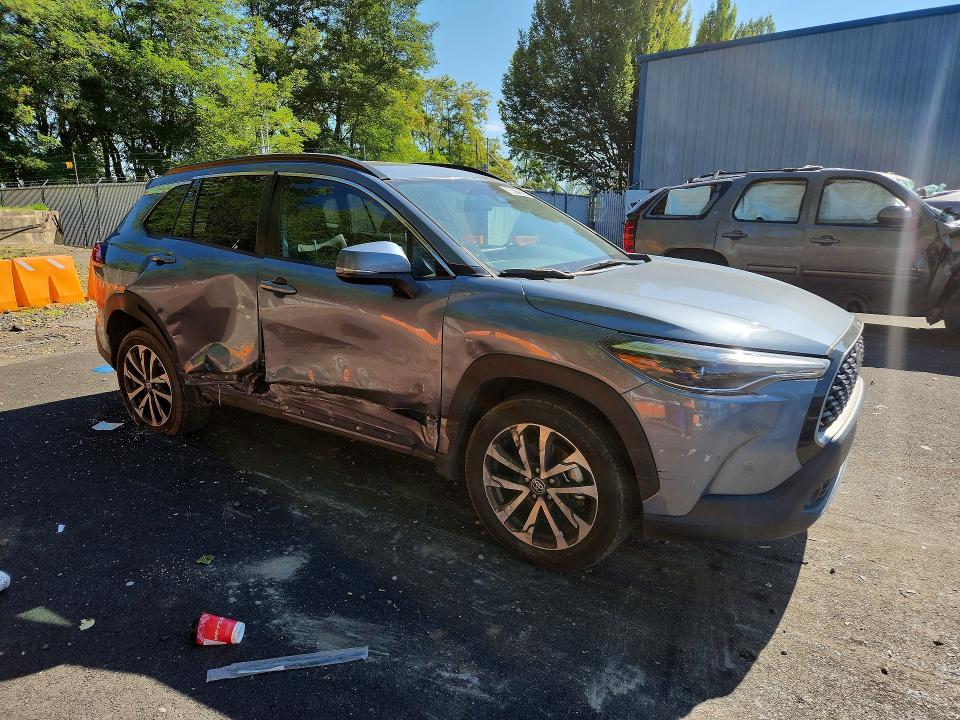 2022 Toyota Corolla cross VIN 7MUDAAAG5NV031464 COPART salvage auction — SIDE, Ca - Certificate Of Title, sold $9,900 on 2026-07-28 (photo 4)