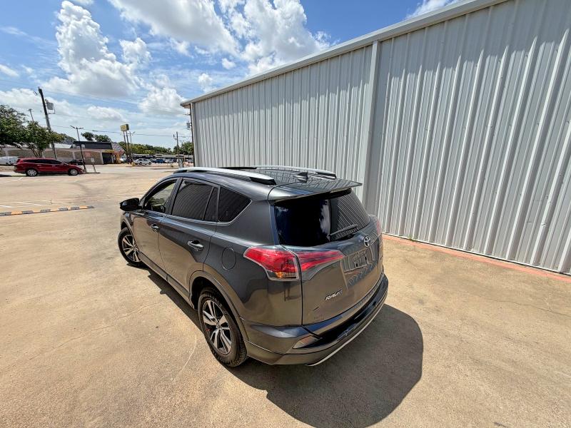 2017 Toyota Rav4 VIN JTMWFREV8HJ711890 COPART salvage auction — MINOR DENT/SCRATCHES, TX - CERTIFICATE OF TITLE (P), sold $29,500 on 2026-07-25 (photo 3)