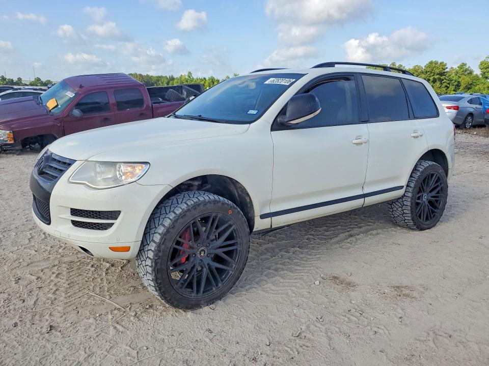 2010 Volkswagen Touareg VIN WVGFK7A93AD000946 COPART salvage auction — SIDE, TX - SALVAGE VEHICLE TITLE (P), sold $1,600 on 2026-08-07 (photo 1)