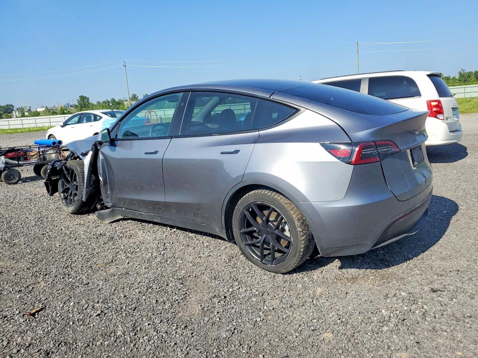 2025 Tesla Model y VIN 7SAYGDEE9SF275268 COPART salvage auction — SIDE, ON - PERMIT NO BRAND - UNFIT, sold $9,500 on 2026-07-23 (photo 2)