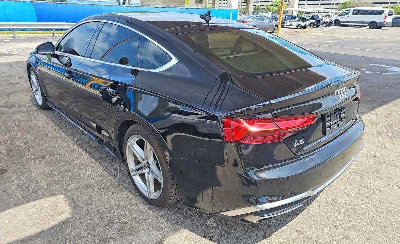 2021 Audi A5 VIN WAUDACF59MA056857 COPART salvage auction — NORMAL WEAR, FL - CERTIFICATE OF TITLE (P), sold $11,600 on 2026-08-24 (photo 3)