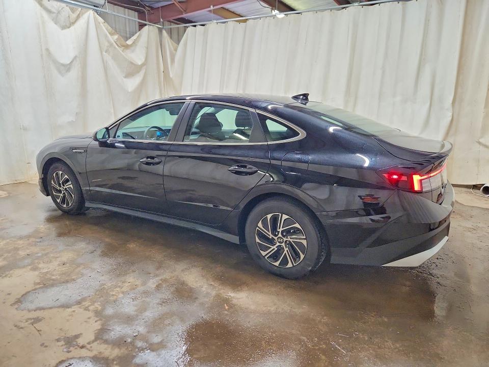 2026 Hyundai Sonata hybrid VIN KMHL24JJ8TA172714 COPART salvage auction — WATER/FLOOD, FL - CERT OF TITLE-SLVG REBLD FLOOD (P), sold $8,900 on 2026-07-27 (photo 2)