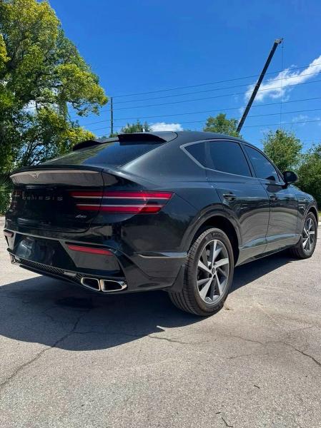 2026 Genesis Gv80 VIN KMUJBESC5TU305894 COPART salvage auction — NORMAL WEAR, FL - CERTIFICATE OF TITLE (P), sold $13,400 on 2026-07-28 (photo 4)