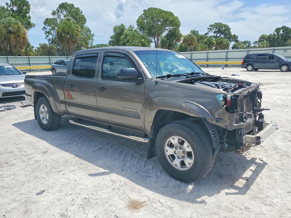 2014 Toyota Tacoma VIN 5TFKU4HNXEX005337 COPART salvage auction — FRONT END, Fl - Cert Of Title Slvg Rebuildable, sold $100 on 2026-07-29 (photo 4)