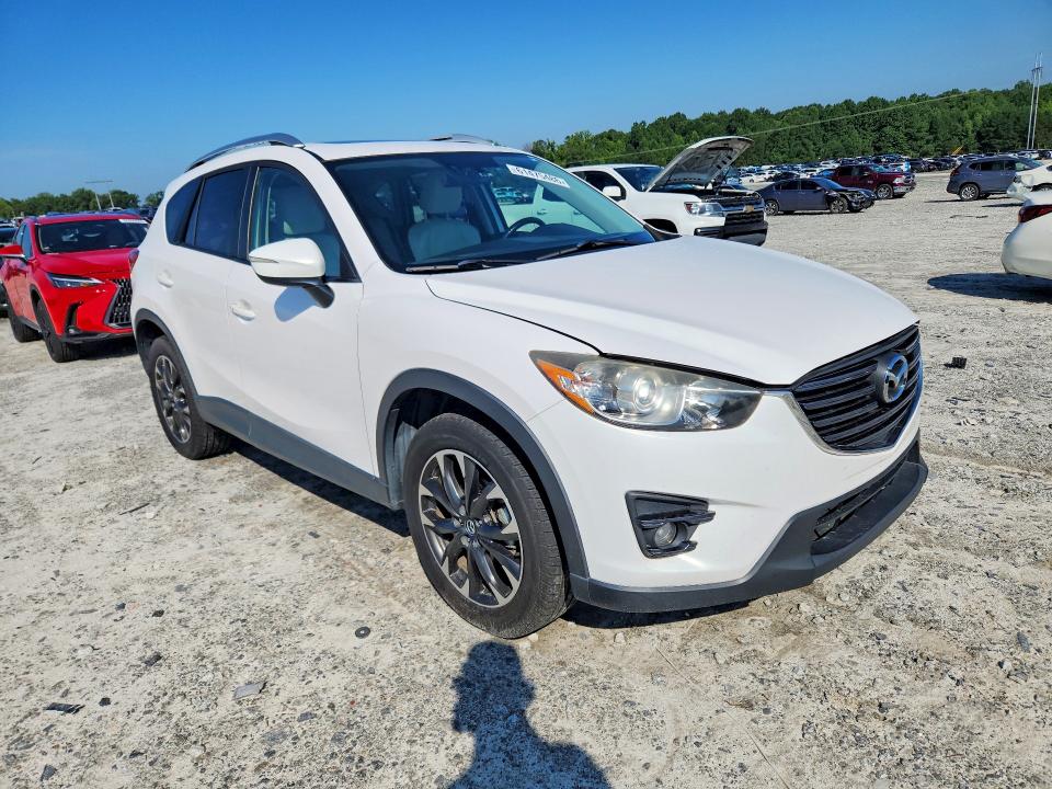 2016 Mazda Cx-5 VIN JM3KE2DY4G0789647 COPART salvage auction — MINOR DENT/SCRATCHES, Ga - Certificate Of Title, sold $2,300 on 2026-07-22 (photo 4)