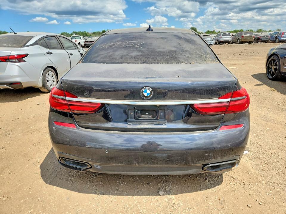 2017 BMW 7er VIN WBA7E4C57HGU99328 COPART salvage auction — SIDE, In - Certificate Of Title (P), sold $2,950 on 2026-08-13 (photo 6)