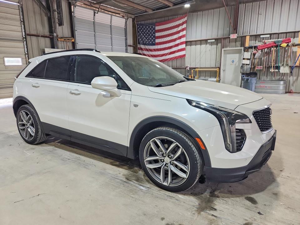 2019 Cadillac Xt4 VIN 1GYFZER40KF199418 COPART salvage auction — SIDE, Mo - Salvage Certificate Of Title, sold $7,600 on 2026-08-24 (photo 4)