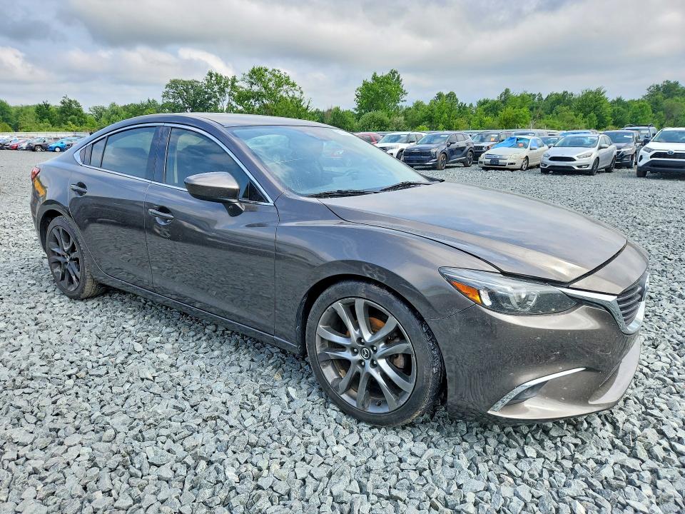 2016 Mazda VIN JM1GJ1W50G1471378 COPART salvage auction — WATER/FLOOD, Oh - Cert Of Title-Salvage Flood, sold $1,700 on 2026-07-27 (photo 4)