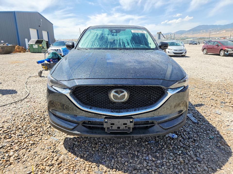 2019 Mazda Cx-5 VIN JM3KFBDY9K0663404 COPART salvage auction — SIDE, Salvage Title, sold $6,100 on 2026-08-21 (photo 5)