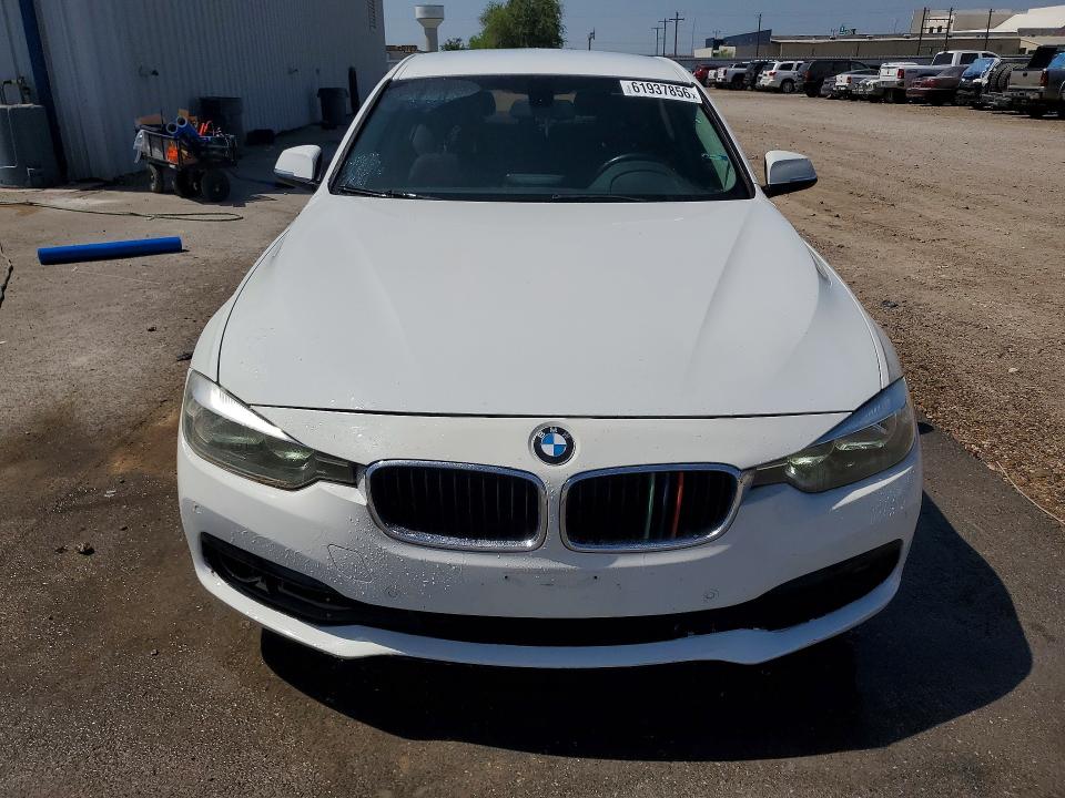 2017 BMW 3 series VIN WBA8E1G57HNU12939 COPART salvage auction — MINOR DENT/SCRATCHES, TX - CERT OF TITLE-REBUILT SALVAGE, sold $3,350 on 2026-07-22 (photo 5)