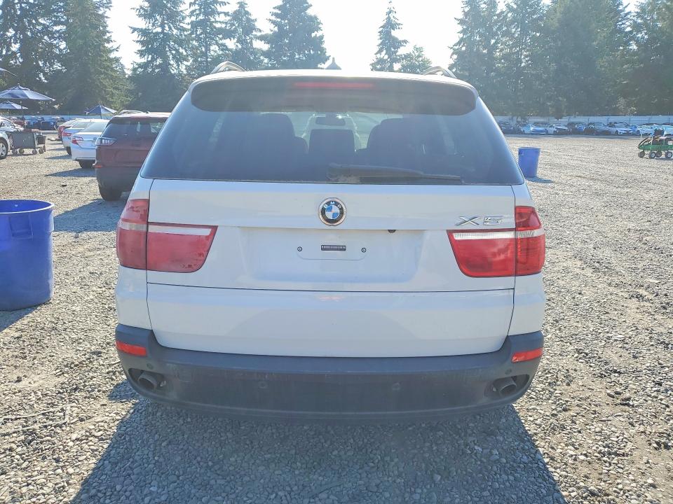 2010 BMW X5 VIN 5UXFE4C58AL381833 COPART salvage auction — MINOR DENT/SCRATCHES, Wa - Aff In Lieu Of Title - Rebuilt, sold $200 on 2026-07-10 (photo 6)