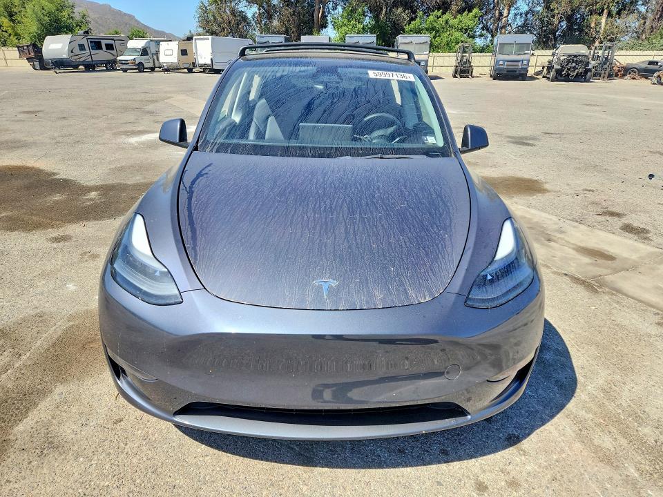 2023 Tesla Model y VIN 7SAYGDEEXPF928052 COPART salvage auction — SIDE, Salvage Title, sold $14,500 on 2026-07-28 (photo 5)