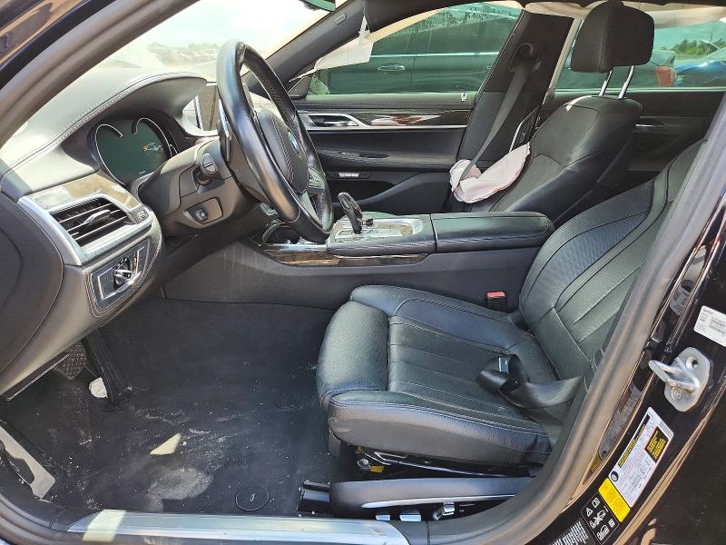 2017 BMW 7er VIN WBA7E4C57HGU99328 COPART salvage auction — SIDE, In - Certificate Of Title (P), sold $2,950 on 2026-08-13 (photo 7)
