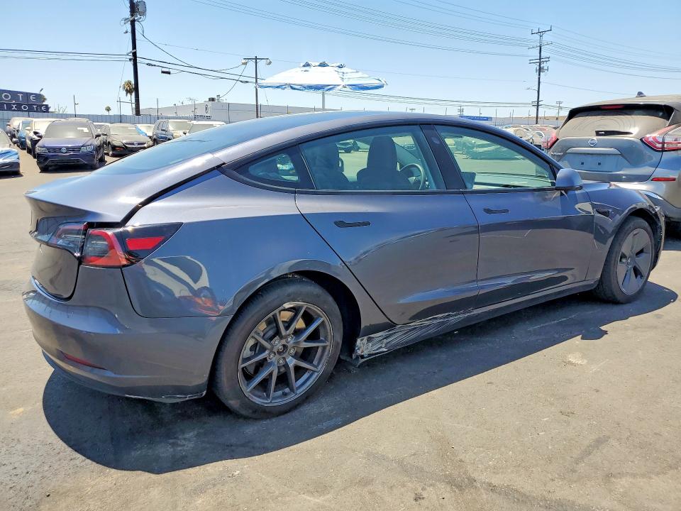 2023 Tesla Model 3 VIN 5YJ3E1EA0PF712946 COPART salvage auction — REAR END, CA - SALVAGE CERTIFICATE, sold $6,400 on 2026-07-29 (photo 3)