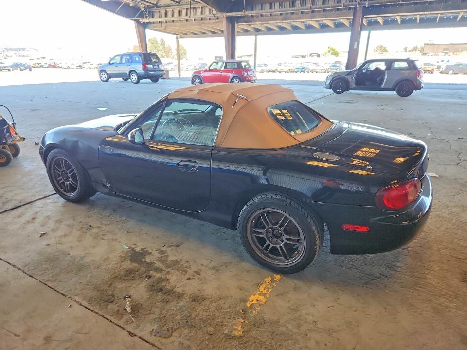 2001 Mazda Mx-5 miata VIN JM1NB353710211945 COPART salvage auction — MINOR DENT/SCRATCHES, Ca - Dis/Dlr/Exp App For Dup Clean, sold $750 on 2026-07-20 (photo 2)
