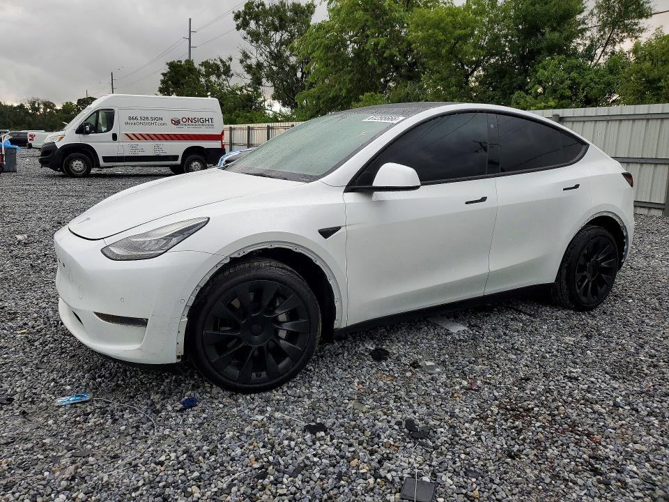 2022 Tesla Model y VIN 7SAYGDEEXNA017150 COPART salvage auction — ALL OVER, FL - CERT OF TITLE SLVG REBUILDABLE, sold $5,500 on 2026-07-24 (photo 1)