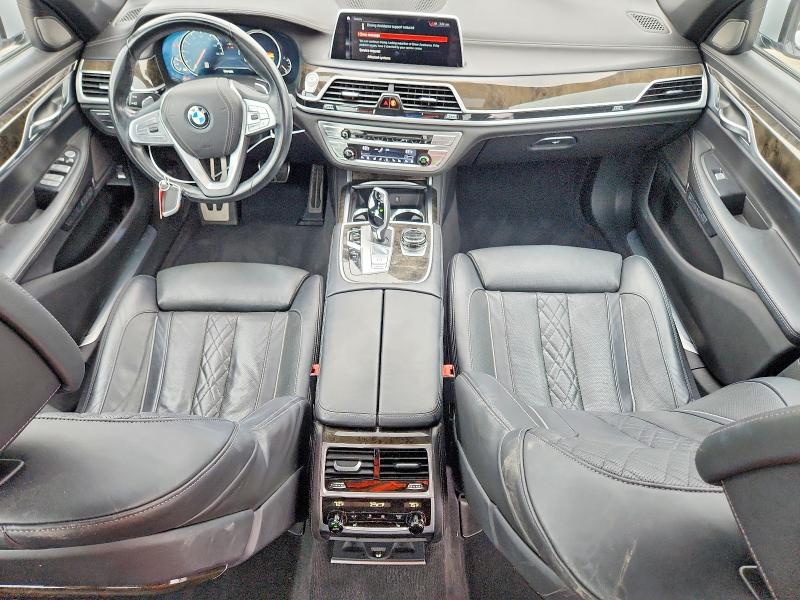 2018 BMW 7er VIN WBA7E4C59JGV28091 COPART salvage auction — FRONT END, Ny - Mv-907A Salvage Certificate, sold $80 on 2026-07-27 (photo 8)