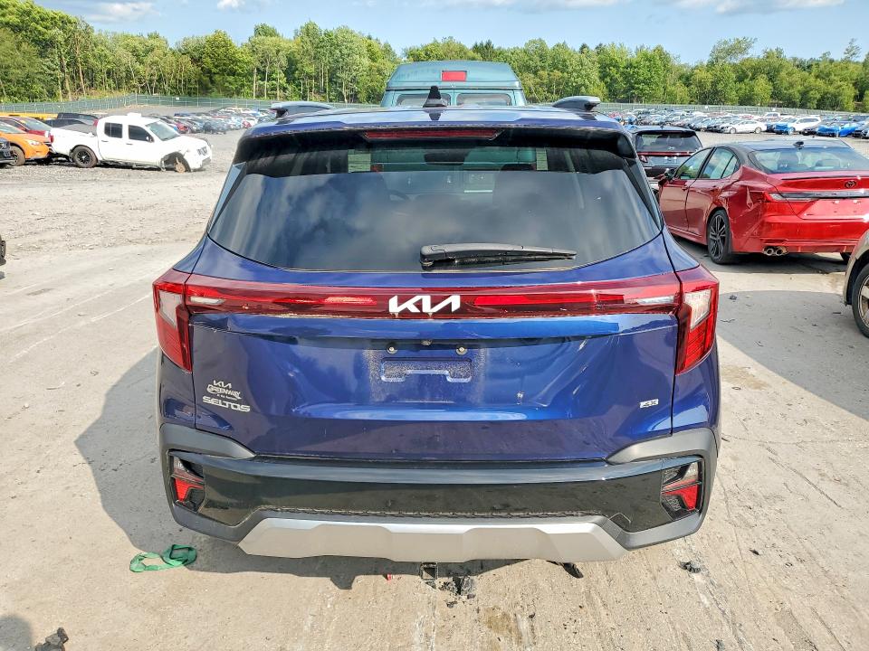 2024 Kia Seltos VIN KNDERCAA0R7557175 COPART salvage auction — MINOR DENT/SCRATCHES, Fl - Certificate Of Title, sold $18,900 on 2026-08-12 (photo 6)