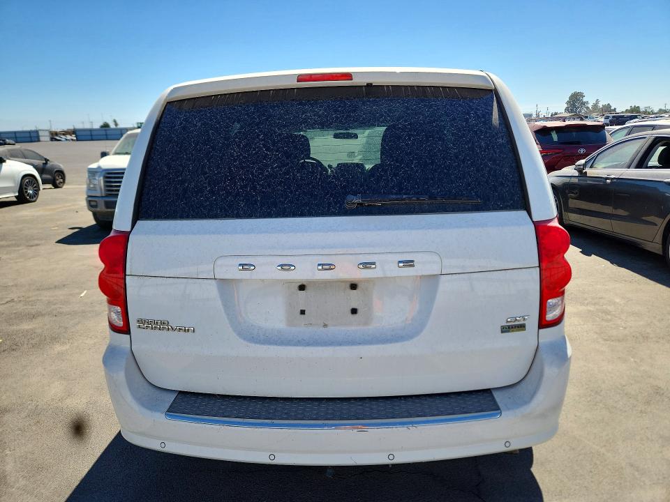 2014 Dodge Caravan VIN 2C4RDGCG5ER344885 COPART salvage auction — MINOR DENT/SCRATCHES, Ca - Dis/Dlr/Exp Only Clean Title, sold $725 on 2026-09-21 (photo 6)