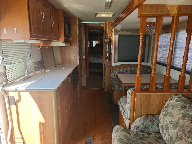 1999 Coachman VIN 3FCNF53S0XJA06288 COPART salvage auction — MINOR DENT/SCRATCHES, OH - CERT OF TITLE-SALVAGE, sold $125 on 2026-07-30 (photo 6)