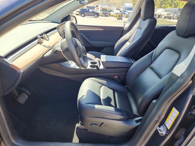 2023 Tesla Model y VIN 7SAYGDEEXPF928052 COPART salvage auction — SIDE, Salvage Title, sold $14,500 on 2026-07-28 (photo 7)