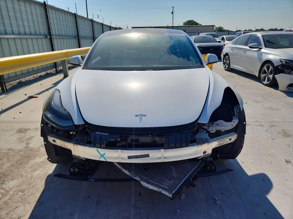2021 Tesla VIN 5YJ3E1EC3MF973341 COPART salvage auction — FRONT END, TX - SALVAGE VEHICLE TITLE (P), sold $5,700 on 2026-07-31 (photo 5)