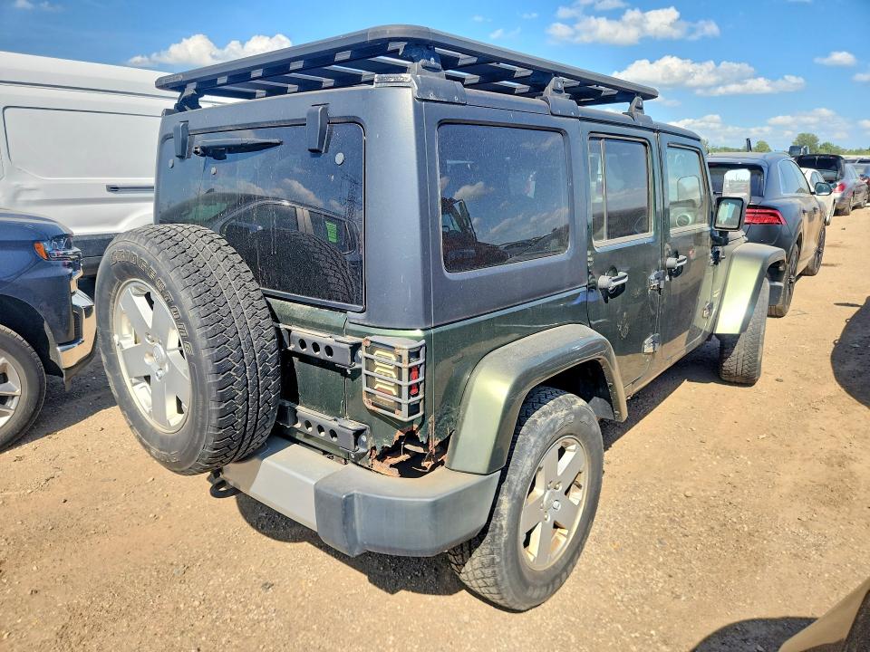 2008 Jeep Wrangler unlimited VIN 1J4GA59198L520500 COPART salvage auction — NORMAL WEAR, IN - CERTIFICATE OF TITLE, sold $2,472 on 2026-07-09 (photo 3)