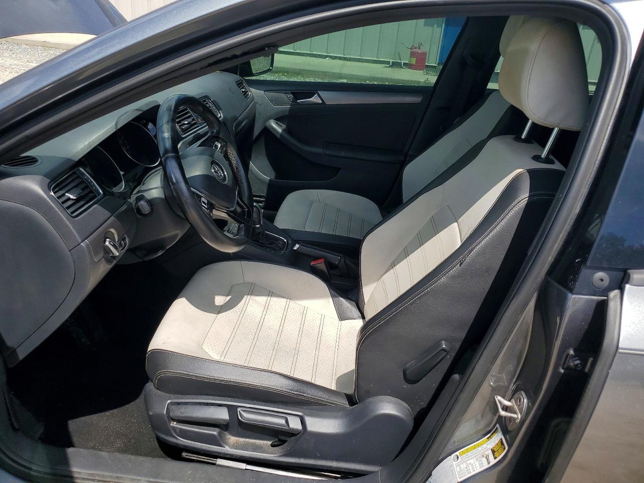 2016 Volkswagen Jetta VIN 3VWD17AJ0GM399236 COPART salvage auction — Minor Dent/Scratches, FL - CERTIFICATE OF TITLE, sold $950 on 2026-09-18 (photo 7)